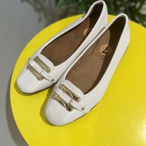 White flats comfy shoes.